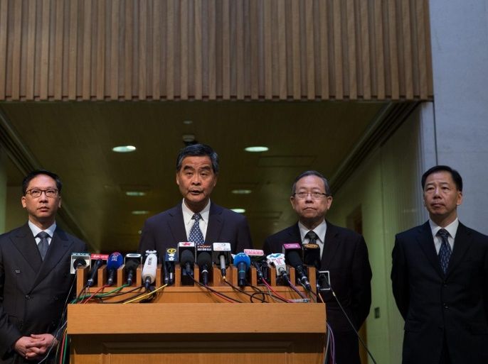 Hong Kong's Chief Executive Leung Chun-ying, (C), Secretary for Justice Rimsky Yuen, (L), Secretary for Security Lai Tung-kwok, (2-R), and Tony Wong Chi-hung, acting Police Commissioner, attend a press conference at the Central Government Offices headquarters in Hong Kong, China, 06 July 2016. Leung and other government officials stressed that Hong Kong had no arrangement with China to transfer fugitives, a day after China's Public Security Bureau has urged bookseller