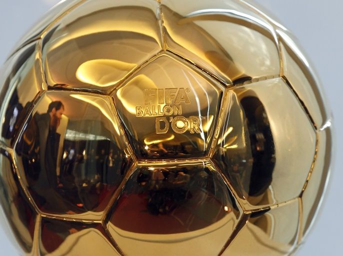 epa03024934 FIFA's Ballon d'Or trophy is seen prior to the press conference to announce the nominees for the FIFA Ballon d'Or 2011 in Boulogne-Billancourt, near Paris, France, 05 December 2011. Lionel Messi is on course to win a third successive world player of the year award after the Argentina international was named as one of three candidates for the Ballon d‘Or. Messi was nominated with Barcelona team-mate Xavi and Real Madrid‘s Cristiano Ronaldo, it was announced at the headquarters of France Football in Paris. EPA/IAN LANGSDON