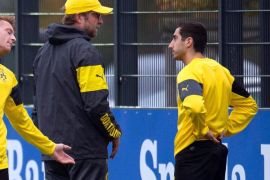 Borussia Dortmund's (L-R) Marco Reus, head coach Juergen Klopp, and Henrikh Mkhitaryan attend their team's training session in Dortmund, Germany, 03 November 2014. Borussia Dortmund will face Galatasaray Istanbul in the UEFA Champions League group D soccer match on 04 November 2014.