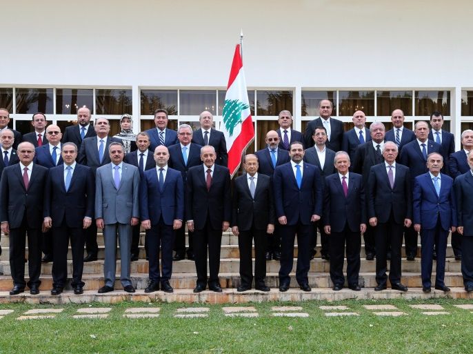 Members of the new Lebanese government pose for a picture at the presidential palace in Baabda, Lebanon December 21, 2016. The members are: (front row L-R) Finance Minister Ali Hassan Khalil, Minister of State for planning Michel Pharaon, Minister of Displaced Talal Erslan, VP and Minister of Public Health Ghassan Hasbani, Parliament Speaker Nabih Berri, President Michel Aoun, Prime minister Saad al-Hariri, Minister of Education Marwan Hamadeh, Minister of Agriculture Ghazi Zaaiter, Minister of State for Parliamentary affairs Ali Kanso, Minister of Youth and Sports Mohammed Fneish. (Middle row L- R) Minister of State for refugees Mouiin el-Mouraabi, Ministry of Labor Mohammad Kabbara, Minister of Justice Salim Jreissati, Minister of Foreign Affairs Gebran Bassil, Minister of State for woman's affairs Jean Ogasapian, Minister of Defense Yaacoub al-Sarraf, Minister of Industry Hussein el Hajj Hassan, Minister of Interior Nohad el Machnouk, Minister of Communications Jamal al-Jarrah, Minister of State for Human rights Ayman Choucair. (Back row L-R) Minister of Economy & Trade Raed Khoury, Minister of Tourism Avadis Kadanian, Minister of Information Melhem Riachi, Minister of State in Administrative Development Inaya Ezzedine, Minister of State for fight against Corruption Nicolas Tueni, Minister of Culture Ghattas Khoury, Minister of State for Presidential Affairs Pierre Raffoul, Minister of Environment Tarek el-Khatib, Minister of Public Works Youssef Fenianos, Minister of Social Affairs Pierre Abi Assi, Minister of Energy & Water Cesar Abi Khalil. Dalati Nohra/Handout via Reuters ATTENTION EDITORS - THIS IMAGE HAS BEEN SUPPLIED BY A THIRD PARTY. FOR EDITORIAL USE ONLY.