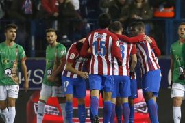 Atletico Madrid's players jubilate the goal scored by their team mate, Argentinian midfielder Fabian Gaitan against CD Guijuelo during their 32th King's Cup round second leg match played at Vicente Calderon stadium in Madrid, Spain on 20 December 2016.