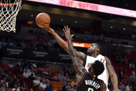 Jan 17, 2017; Miami, FL, USA; Miami Heat guard Dion Waiters (11) drives to the basket as Houston Rockets guard Patrick Beverley (2) applies pressure during the second half at American Airlines Arena. The Heat won 109-103. Mandatory Credit: Steve Mitchell-USA TODAY Sports