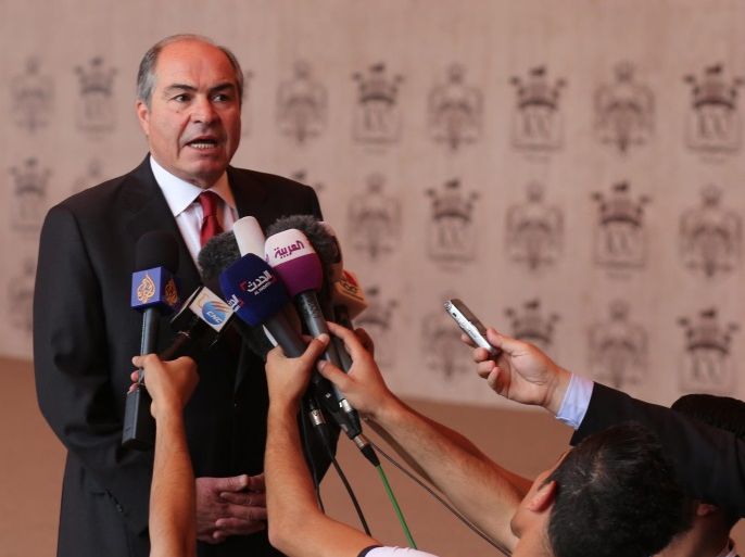 Jordanian Prime Minister Hani Mulki speaks to reporters after the swearing-in ceremony for the new cabinet at Ragadan Royal Palace, Amman, Jordan, 01 June 2016. The new prime minister and his Cabinet were sworn in before King Abdullah II of Jordan during a ceremony that was attended by Jordanian officials, a Royal Decree was issued on the same day approving the new government led by Hani Mulki.
