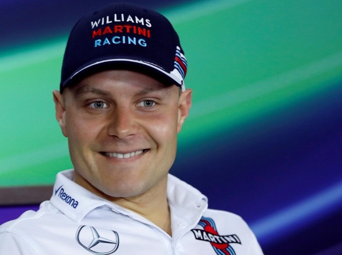 FILE PHOTO - Formula One - Chinese Grand Prix - Shanghai, China - 4/14/16 -Williams Formula One driver Valtteri Bottas of Finland smiles during a news conference at the Shanghai International Circuit ahead of the Chinese F1 Grand Prix. REUTERS/Aly Song/File Photo