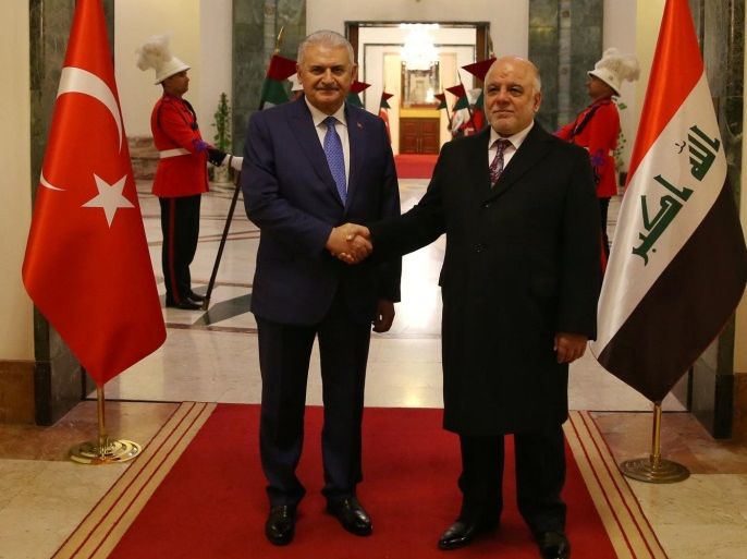 Turkey's Prime Minister Binali Yildirim meets with his Iraqi counterpart Haider al-Abadi in Baghdad, Iraq, January 7, 2017. Hakan Goktepe/Prime Minister's Press Office/Handout via REUTERS ATTENTION EDITORS - THIS PICTURE WAS PROVIDED BY A THIRD PARTY. FOR EDITORIAL USE ONLY. NO RESALES. NO ARCHIVE.