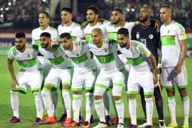 Algerian national soccer team players line up before the FIFA World Cup 2018 qualifying soccer match between Algeria and Cameroon at the Mustapha Tchaker Stadium in Blida south of Algiers, Algeria, 09 October 2016.