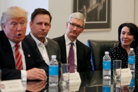 U.S. President-elect Donald Trump speaks as (2nd L to R) PayPal co-founder and Facebook board member Peter Thiel, Apple Inc CEO Tim Cook and Oracle CEO Safra Catz look on during a meeting with technology leaders at Trump Tower in New York U.S., December 14, 2016. REUTERS/Shannon Stapleton