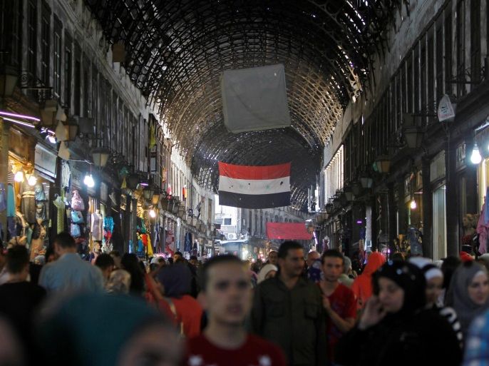 People shop ahead of eid celebrations in al-Hamidiyah Souq in Damascus, Syria September 10, 2016. REUTERS/Omar Sanadiki
