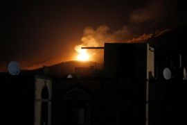 An explosion at a military arms depot is seen after it was hit by a Saudi-led air strike on the Nuqom Mountain overlooking Yemen's capital Sanaa, October 14, 2016. REUTERS/Mohamed al-Sayaghi