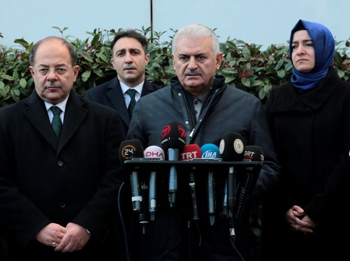 Turkish Prime Minister Binali Yildirim, accompanied by Health Minister Recep Akdag (L) and Minister of Family and Social Policies Fatma Betul Sayan Kaya (R), talks to media after he visited survivors of the nightclub attack at a hospital in Istanbul, Turkey, January 1, 2017. Ali Balikci/Prime Minister's Press Office/Handout via REUTERS ATTENTION EDITORS - THIS PICTURE WAS PROVIDED BY A THIRD PARTY. FOR EDITORIAL USE ONLY. NO RESALES. NO ARCHIVE.
