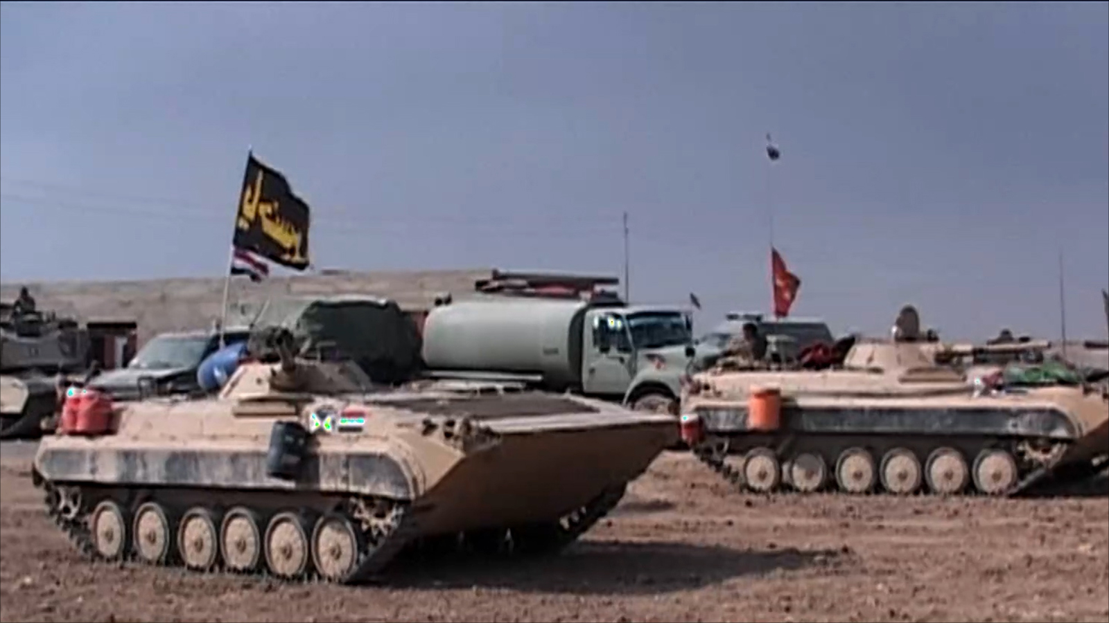قوات من الحشد الشعبي خلال عملياتها في الموصل (الجزيرة)