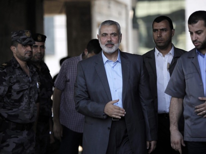 Senior Hamas figure Sheikh Ismail Haniyeh arrives to attend a military graduation ceremony for young Palestinians organised by Ezz Al-Din Al Qassam militia, the military wing of Hamas movement, in Gaza City, 05 Augast 2015. Thousands of young Palestinians joined Ezz Al-Din Al Qassam military-style summer camps during school vocation in the Gaza Stripto prepare them to confront any possible Israeli attack.