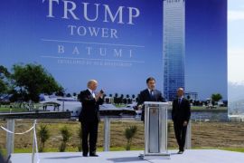 Georgian President Mikheil Saakashvili (C) and U.S. property mogul Donald Trump (L) take part in a ceremony in the Black sea resort of Batumi April 22, 2012. Trump flew into the former Soviet republic of Georgia on Saturday to expand his global real estate empire, lending his name to a glitzy tower on the Black Sea coast there. REUTERS/Presidential Press Service/Handout (GEORGIA - Tags: POLITICS BUSINESS REAL ESTATE) FOR EDITORIAL USE ONLY. NOT FOR SALE FOR MARKETING OR ADVERTISING CAMPAIGNS. THIS IMAGE HAS BEEN SUPPLIED BY A THIRD PARTY. IT IS DISTRIBUTED, EXACTLY AS RECEIVED BY REUTERS, AS A SERVICE TO CLIENTS