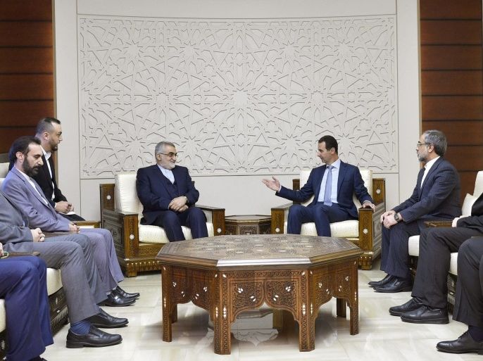 A handout photo made available by Syrian Arab News Agency (SANA) shows Syrian President Bashar al-Assad (C-R) meeting with Chairman of the Committee for Foreign Policy and National Security at the Iranian Shura Council, Alaeddin Boroujerdi (C-L) and the accompanying delegation in Damascus, Syria, 04 January 2017. EPA/SANA HANDOUT