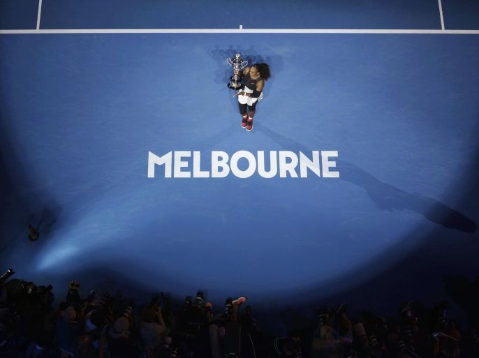 Tennis - Australian Open - Melbourne Park, Melbourne, Australia - 28/1/17 Serena Williams of the U.S. holds her trophy after winning her Women's singles final match against Venus Williams of the U.S. .REUTERS/Jason Reed