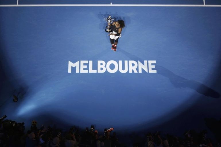 Tennis - Australian Open - Melbourne Park, Melbourne, Australia - 28/1/17 Serena Williams of the U.S. holds her trophy after winning her Women's singles final match against Venus Williams of the U.S. .REUTERS/Jason Reed