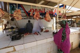 Customers wait to buy meat at a market in Khartoum, Sudan December 2, 2016. REUTERS/Mohamed Nureldin Abdallah