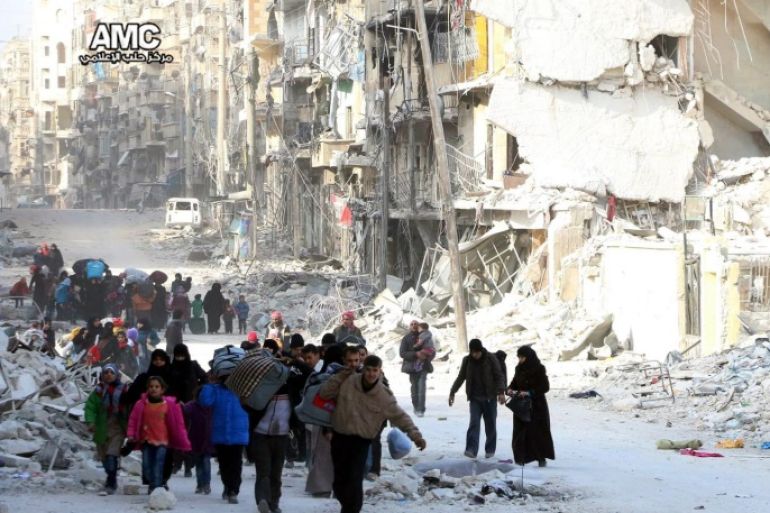 A handout picture made available by Aleppo Media Center (AMC) shows displaced Syrian families leave the neighborhoods where the fighting occurs in eastern Aleppo, Syria, 29 November 2016. According to AMC 53 Syrians died on the same day due to air and bomb strikes on neighborhoods in the eastern part of Aleppo. According to the United Nations (UN) about 16 thousand people were displaced in Aleppo since the fight started between the rebels and the regime on 15 November 2