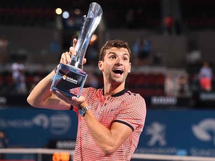 Grigor Dimitrov of Bulgaria poses with the winners trophy after defeating Kei Nishikori of Japan in the men's singles final at the Brisbane International Tennis Tournament in Brisbane, Australia, 08 January 2017. EPA/DAVE HUNT AUSTRALIA AND NEW ZEALAND OUT