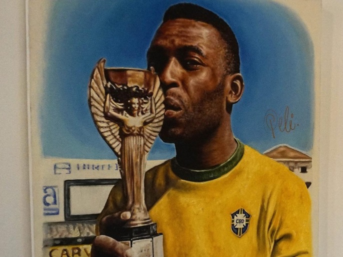 The 1969 Brazil National soccer team signed jersey is displayed next to a painting of Brazilian soccer star Pele as part of the Sports Icon and Idols auction at Julien's Auctions in Los Angeles, California, USA, 29 November 2016. Brazilian sports legend Pele and US boxing legend Muhammad Ali and other sports memorabilia will be auctioned 03 December 2016. The jersey is expected to sell between 3,000-5,000 US dollars.