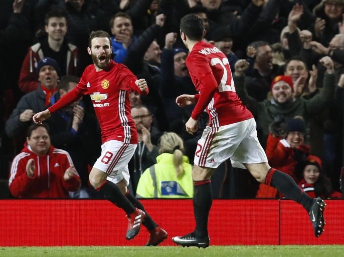 Britain Football Soccer - Manchester United v Hull City - EFL Cup Semi Final First Leg - Old Trafford - 10/1/17 Manchester United's Juan Mata celebrates scoring their first goal with Henrikh Mkhitaryan Action Images via Reuters / Jason Cairnduff Livepic EDITORIAL USE ONLY. No use with unauthorized audio, video, data, fixture lists, club/league logos or "live" services. Online in-match use limited to 45 images, no video emulation. No use in betting, games or single club/league/player publications. Please contact your account representative for further details.