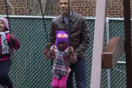 US President Barack Obama pushes children on swings on 'Malia and Sasha's Castle', a play-set that was formerly used by the Obama children at the White House and donated by the Obama family, during a service event for Martin Luther King Jr. Day at the Jobs Have Priority Naylor Road Family Shelter in Washington, DC, USA, 16 January 2017. The Martin Luther King Jr. federal holiday commemorates what would have been the slain civil rights leader's 88th birthday.