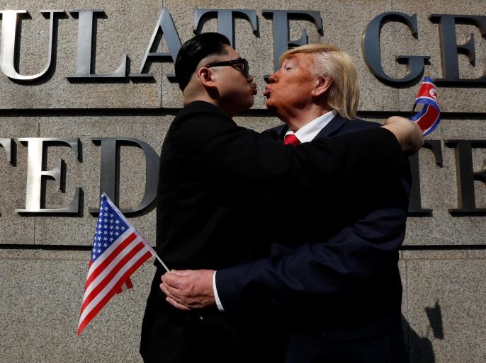 Dennis Alan of Chicago, 66, who is impersonating U.S. President Donald Trump, and Howard, 37, an Australian-Chinese who is impersonating North Korean leader Kim Jong-un, pose outside U.S. Consulate in Hong Kong, China January 25, 2017. REUTERS/Bobby Yip TPX IMAGES OF THE DAY