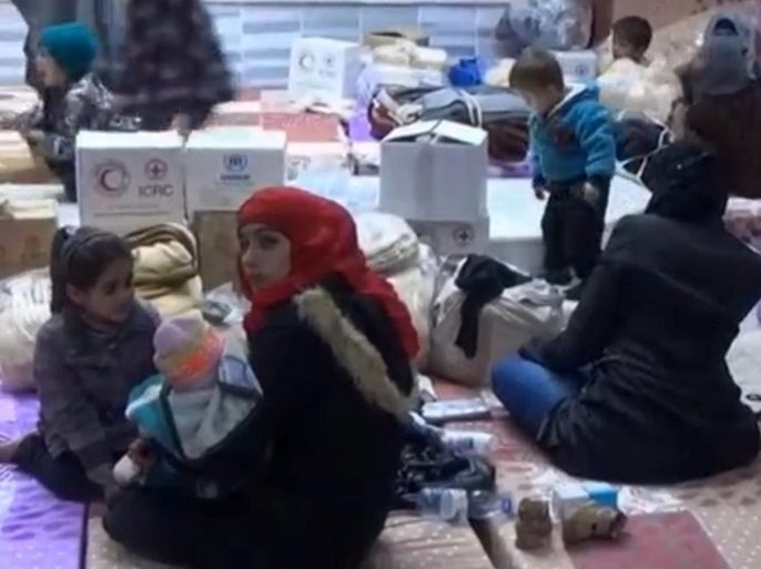 A still image taken from a video obtained by Reuters, said to be shot on January 4, 2017, shows civilians, who were evacuated from Wadi Barada, sitting inside a shelter in the Damascus suburb of Rawda, Syria. REUTERS TV/via REUTERS ATTENTION EDITORS - THIS IMAGE WAS PROVIDED BY A THIRD PARTY. EDITORIAL USE ONLY. NO RESALES. NO ARCHIVE.