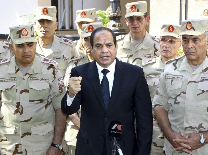 Egyptian President Abdel Fattah al-Sisi gives a speech outside the Supreme Council in Cairo October 25, 2014, in this handout courtesy of the Egyptian Presidency. REUTERS/The Egyptian Presidency/Handout via Reuters (EGYPT - Tags: POLITICS MILITARY) ATTENTION EDITORS - THIS PICTURE WAS PROVIDED BY A THIRD PARTY. REUTERS IS UNABLE TO INDEPENDENTLY VERIFY THE AUTHENTICITY, CONTENT, LOCATION OR DATE OF THIS IMAGE. NO SALES. NO ARCHIVES. FOR EDITORIAL USE ONLY. NOT FOR SALE FOR MARKETING OR ADVERTISING CAMPAIGNS. THIS PICTURE IS DISTRIBUTED EXACTLY AS RECEIVED BY REUTERS, AS A SERVICE TO CLIENTS