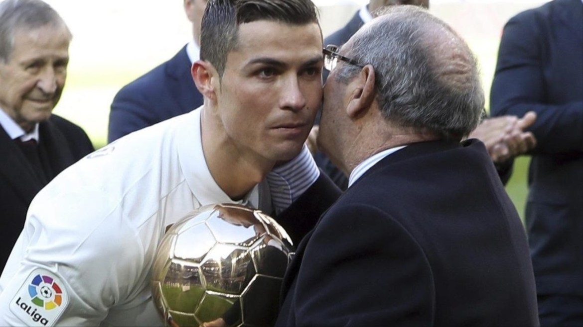 Real Madrid's Portuguese forward Cristiano Ronaldo (L) receives his fourth Ballon d'Or trophy from former soccer player Francisco Gento (R) prior to the start of their Spanish Primera Division League's soccer match against Granada at the Santiago Bernabeu stadium in Madrid, Spain, 07 January 2017.