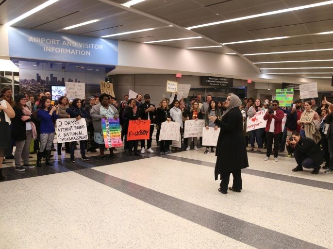 Protesters gather at George Bush Intercontinental Airport in Houston, Texas, U.S., January 28, 2017. REUTERS/Trish Badger
