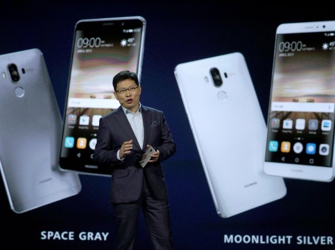 Richard Yu, Huawei CEO Consumer Business Group, talks about their Huawei Mate 9 smartphone just released to the U.S. market and displayed behind him during his keynote address at CES in Las Vegas, January 5, 2017. REUTERS/Rick Wilking