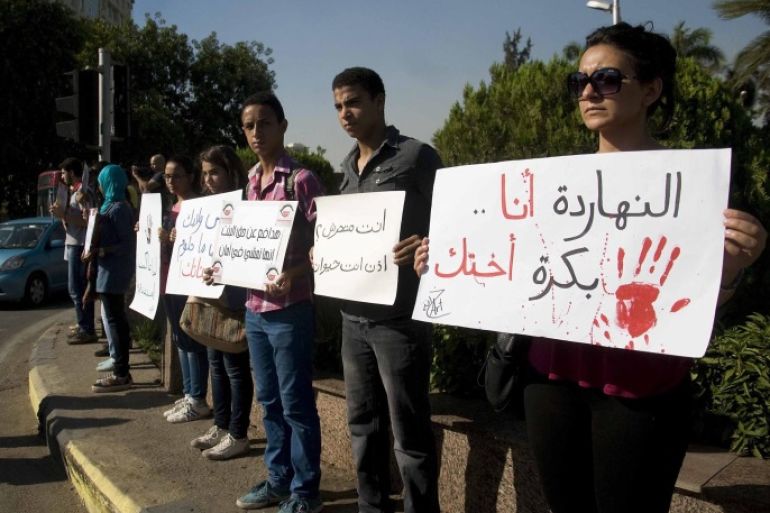 Egyptian protesters hold banners against sexual harassment during a gathering in Cairo, Egypt, 14 June 2014. At least five cases of sexual assault were reported on 08 June while thousands were celebrating al-Sissi's inauguration in central Cairo's Tahrir Square. A law stipulating harsher punishments for sexual harassment - including between six months and five years in prison was passed last week after a graphic video of a naked woman circulated online. EPA/NAMEER GALAL/ALMASRY ALYOUM EGYPT OUT *** Local Caption *** 51309221 *** Local Caption *** 51309221