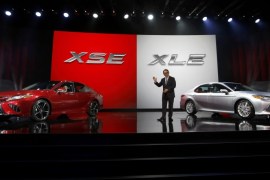 Akio Toyoda, president of Toyota Motor Corporation, introduces the 2018 Camry XSE (L) and the 2018 Camry XLE during the North American International Auto Show in Detroit, Michigan, U.S., January 9, 2017. REUTERS/Mark Blinch
