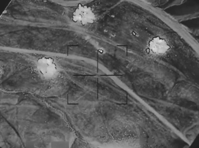 A frame grab obtained from a handout video by the US Department of Defense on 10 December 2016 shows oil tankers allegedly belonging to the militant group calling itself Islamic State (IS) being hit by airstrikes at an undisclosed location in central Syria, 08 December 2016. According to the US military, coalition airstrikes by the 'Operation Inherent Resolve' targeted 168 oil trucks.