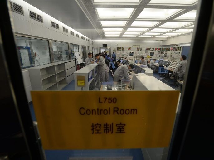 File photo dated 14 May 2013 of staff working in the control room of the Hongyanhe Nuclear Power Plant in Wafangdian in northeast China's Liaoning province. China's top planner has approved on 11 March 2015, the construction of two new reactors at Hongyanhe, operated by the state-owned China General Nuclear Power Corp. It is China's first new nuclear power project in two years as the country seeks less dependence on the fossil energy. EPA/ALLEN MEI CHINA OUT
