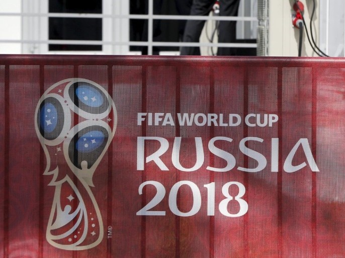 The 2018 World Cup logo is pictured on a barrier near the Konstantin (Konstantinovsky) Palace, the venue of the preliminary draw for the 2018 World Cup, in St. Petersburg, July 24, 2015. The 2018 World Cup's preliminary draw will be held in St. Petersburg on July 25. REUTERS/Maxim Shemetov