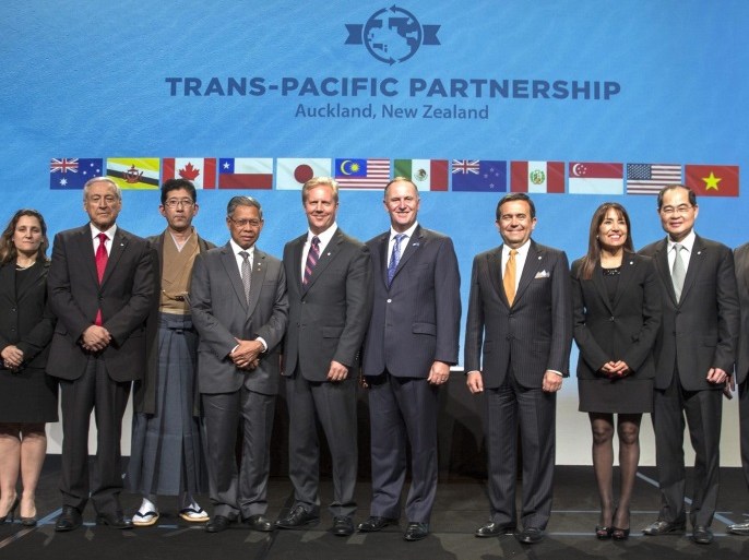 (FILE) A file handout picture provided by the New Zealand Ministry of Foreign Affairs and Trade (MFAT) on 04 February 2016 shows delegates posing for a group photo after the signing of the Trans Pacific Partnership (TPP) trade agreement in Auckland, New Zealand. US President-elect Donald Trump on 21 November 2016 announced that his administration intends to withdraw from the TPP agreement once he takes office in January 2017. The Trans-Pacific Partnership involves a doz