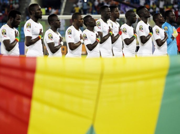 Senegal national soccer team players listen to their national anthem before the start of their Group C soccer match against Algeria in the African Cup of Nations in Malabo January 27, 2015. REUTERS/Amr Abdallah Dalsh (EQUATORIAL GUINEA - Tags: SPORT SOCCER)