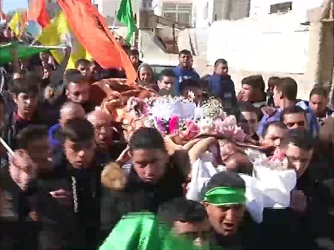 تشييع في مدينة الخليل جنازة مشتركة للشهيدين محمد كايد الرجبي وحاتم عبد الحفيظ الشلودي.