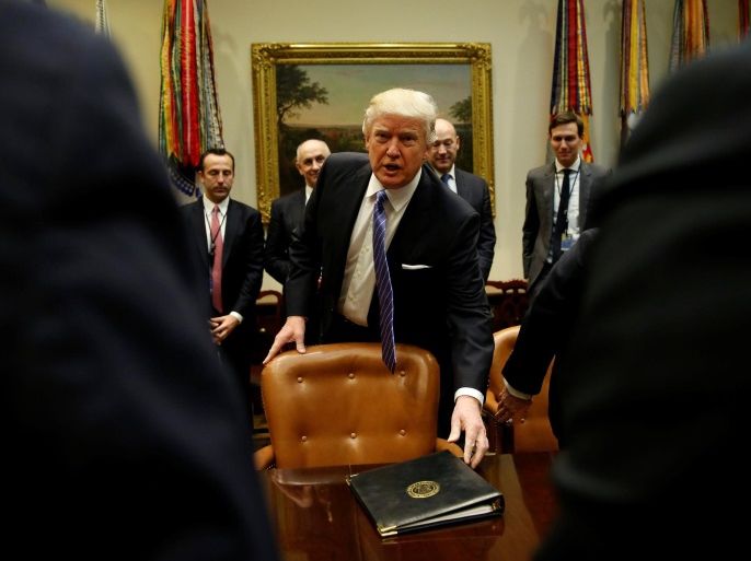 U.S. President Donald Trump arrives for a meeting with business leaders in the Roosevelt Room of the White House in Washington January 23, 2017. REUTERS/Kevin Lamarque