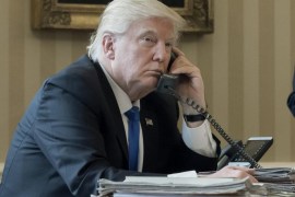 US President Donald J. Trump (L) speaks on the phone with President of Russia Vladimir Putin, with White House Chief of Staff Reince Priebus (R) behind, in the Oval Office of the White House in Washington, DC, USA, 28 January 2017. President Trump has chosen the day to talk with different world leaders, significantly Russia's Vladimir Putin and Germany's Angela Merkel by telephone.