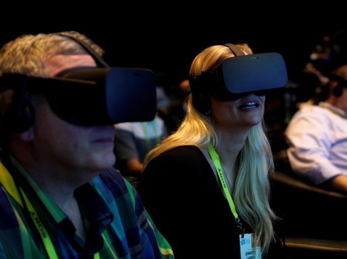 Showgoers wear Oculus Rift virtual reality headsets during the Intel press conference at CES in Las Vegas, January 4, 2017. REUTERS/Rick Wilking