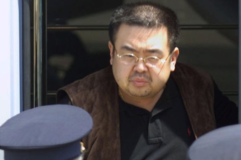 FILE PHOTO: North Korean heir-apparent Kim Jong Nam emerges from a bus as he is escorted by Japanese authorities upon his deportation from Japan at Tokyo's Narita international airport May 4, 2001. REUTERS/Eriko Sugita/File Photo