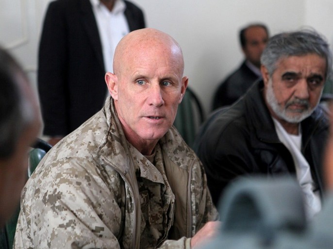 FILE PHOTO - Vice Adm. Robert S. Harward, commanding officer of Combined Joint Interagency Task Force 435, speaks to an Afghan official during his visit to Zaranj, Afghanistan, in this January 6, 2011 handout photo. Sgt. Shawn Coolman/U.S. Marines/Handout via REUTERS/File Photo ATTENTION EDITORS - THIS IMAGE WAS PROVIDED BY A THIRD PARTY. EDITORIAL USE ONLY TPX IMAGES OF THE DAY