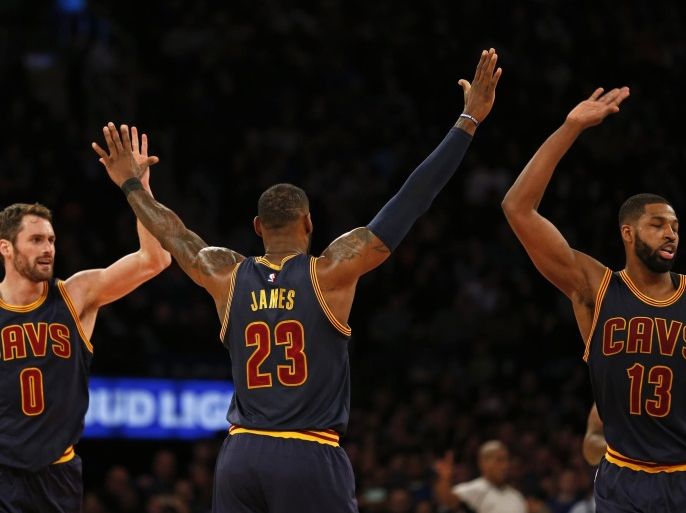 Feb 4, 2017; New York, NY, USA; Cleveland Cavaliers forward LeBron James (23) celebrates with Cavaliers center Tristan Thompson (13) and Cavaliers forward Kevin Love (0) during the second half against the New York Knicks at Madison Square Garden. Mandatory Credit: Adam Hunger-USA TODAY Sports