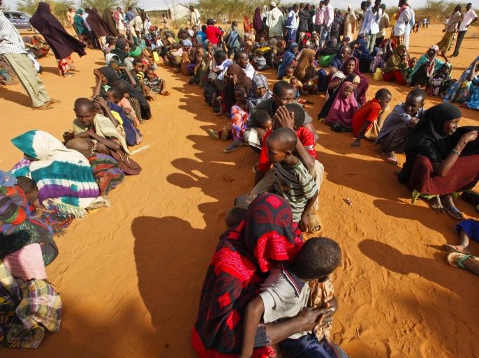 (FILE) - Newly arrived refugees who had fled the famine-hit Somalia waiting in line at a reception at Ifo camp, one of three camps that make up sprawling Dadaab refugee camp in Dadaab, northeastern Kenya, 01 August 2011 (reissued 09 February 2017). The Kenyan High Court on 09 February 2017 ruled against the government's intention to close the world's largest refugee camp at the border with Somalia.