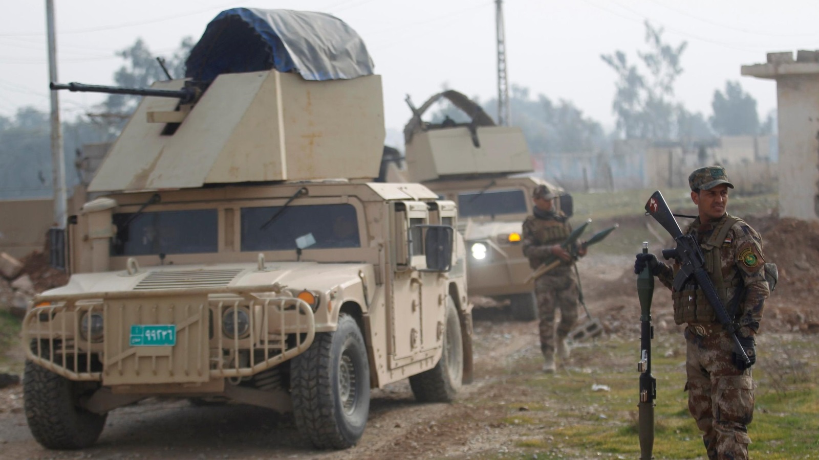 قوات عراقية أثناء القتال ضد تنظيم الدولة قرب حي العربي شمال شرق الموصل 