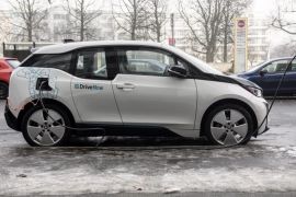An electric BMW i3 car of the car sharing company Drive Now, charges at a charging station in Berlin, Germany, 20 January 2017.