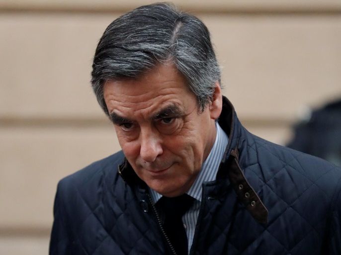 Francois Fillon, former French prime minister, member of The Republicans political party and 2017 presidential candidate of the French centre-right, leaves home in Paris, France, February 1, 2017. REUTERS/Christian Hartmann